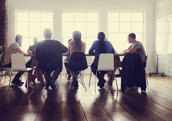 people at a meeting table